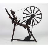 A 19th Century Irish oak Spinning Wheel.