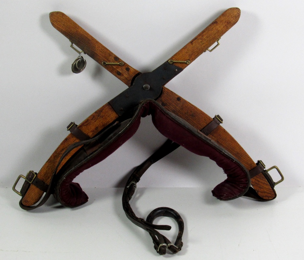 An old leather and oak frame X shaped Horse Training Frame.