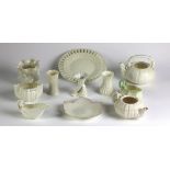 A collection of various Belleek Items, from different periods including miniature cornucopia, jugs,