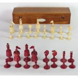 A 19th Century carved ivory Chess Set, with wooden box.