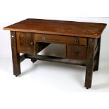 An early 20th Century Arts & Crafts oak Desk,