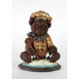 An unusual painted metal Door Stop, modelled as a Teddy Bear wearing chef's attire, approx.