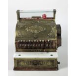 A good quality attractive Edwardian heavily decorated brass Cash Register by Stevenson, Manchester.