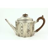 An attractive English George III shaped oval bright cut silver Teapot, London c. 1809, by R.H.