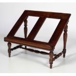 A 19th Century mahogany Bookstand, on turned supports.