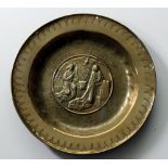 A good early German brass Alms Dish, probably 16th Century,