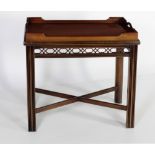 A Chinese Chippendale style Butlers Tray on stand, with pierced fret work apron,