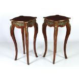 An attractive pair of square serpentine shaped walnut and kingwood Pedestal Tables,