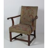 A George III period mahogany Gainsborough Library Armchair,