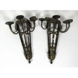 A pair of Art Metal five branch Candle Wall Lights, with tubular frame and leaf moulded decoration.