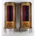 A pair of French style demi-lune Vernet Martin style Vitrines,