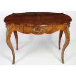 A Victorian serpentine shaped oval walnut Centre Table, with nicely figured top and shaped apron,