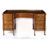 A fine quality Edwardian satinwood kidney shaped kneehole Desk, by Hobbs & Co.