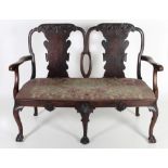 A fine Chippendale style walnut double chair back Settee,
