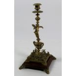 A tall elaborate Table Candlestick, with cupids support,