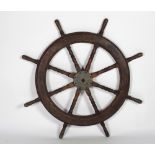 A large antique oak and mahogany Ships Wheel,