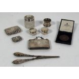 A Chester silver Ladies Purse and chain, a small silver Cigarette Case, a silver Vesta Case,