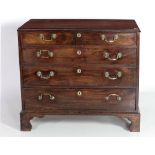 A Georgian mahogany Chest, with later moulded top over two short and three long drawers,