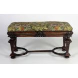 A good 19th Century carved walnut Duet Stool, with floral tapestry seat.