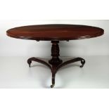 A fine quality Regency period oval Dining Table,