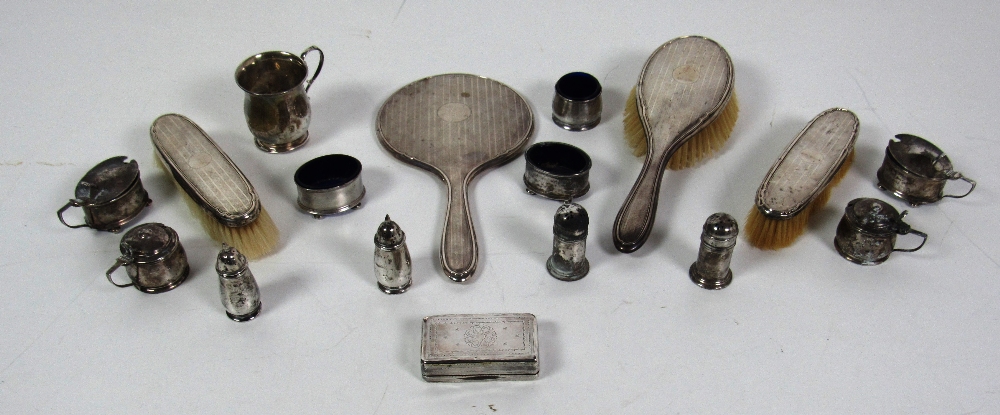 Silverware: A collection of varied Silver Condiments, including salt and peppers,mustard pots,