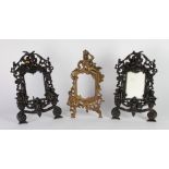 A fine quality pair of heavy pierced and decorated bronze Picture Frames,