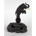 An attractive Japanese bronze Elephant, Meiji period (1868 - 1912) signed,