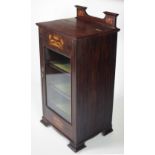An inlaid Edwardian Arts & Crafts style Music Cabinet, with lift up sheet holder.