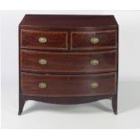 An attractive George III inlaid and crossbanded bow fronted mahogany Chest,