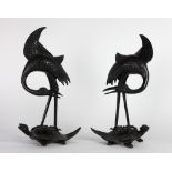 A pair of 19th Century Chinese bronze Figures of Flamingos standing on the backs of turtles,