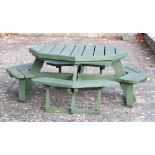 A modern painted wooden octagonal Garden Table and Chairs, (united together).