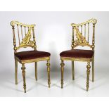 A pair of unusual 19th Century giltwood Side Chairs, with lyre decorated backs,