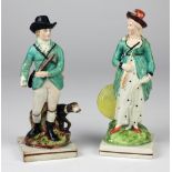 A pair of 19th Century Ralph Wood type Figures, Huntsman & Lady Companion, approx.