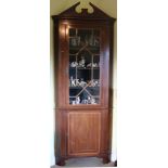 A 19th Century mahogany Corner Cabinet, with pediment, astragal glazed doors,