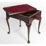 A 19th Century Irish mahogany Games Table, the plain dish top with reversible sides,