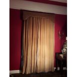 A pair of light brown lined and interlined Curtains, with frilled edges and matching pelmets,