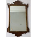 An attractive 19th Century walnut Wall Mirror, with carved frame,