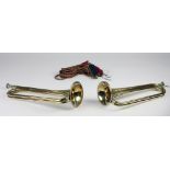 A pair of large copper and brass Bugle Horns, by Henry Keat & Sons, London, dated 1916,