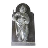 An unusual 18th Century silver Dutch embossed wall mount of a Saint,