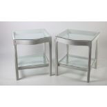 A pair of painted wooden bow fronted glass topped two shelf Bedside Tables,
