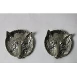 A pair of silver plated fox head Ash Trays.