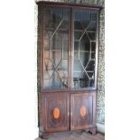 A Georgian mahogany inlaid Corner Cabinet,