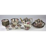 A colourful hand painted 19th Century English porcelain Tea Service, possibly Rockingham,