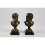 A good pair of 19th Century French bronze Busts, a Smiling Infant and a Crying Infant,