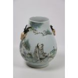 A fine Chinese Famille Rose porcelain Vase, decorated with a seated figure by a bamboo fence,