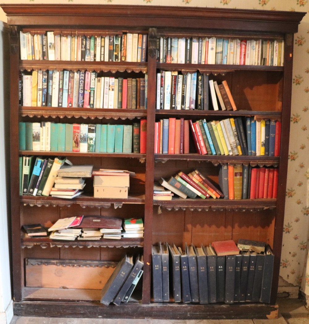 A late 19th Century mahogany Open Bookcase, with leather frills, on plinth base,