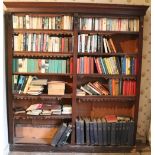 A late 19th Century mahogany Open Bookcase, with leather frills, on plinth base,