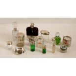 A large collection of Perfume and other cut-glass Scent Bottles, with silver mounts, etc, as a lot,