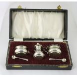 A cased three piece silver Condiment Set: Salt, Mustard and Pepper, Birmingham 1966,