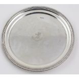 A small plain circular silver Salver, with gadroon edge and crested, Sheffield c. 1910, approx.